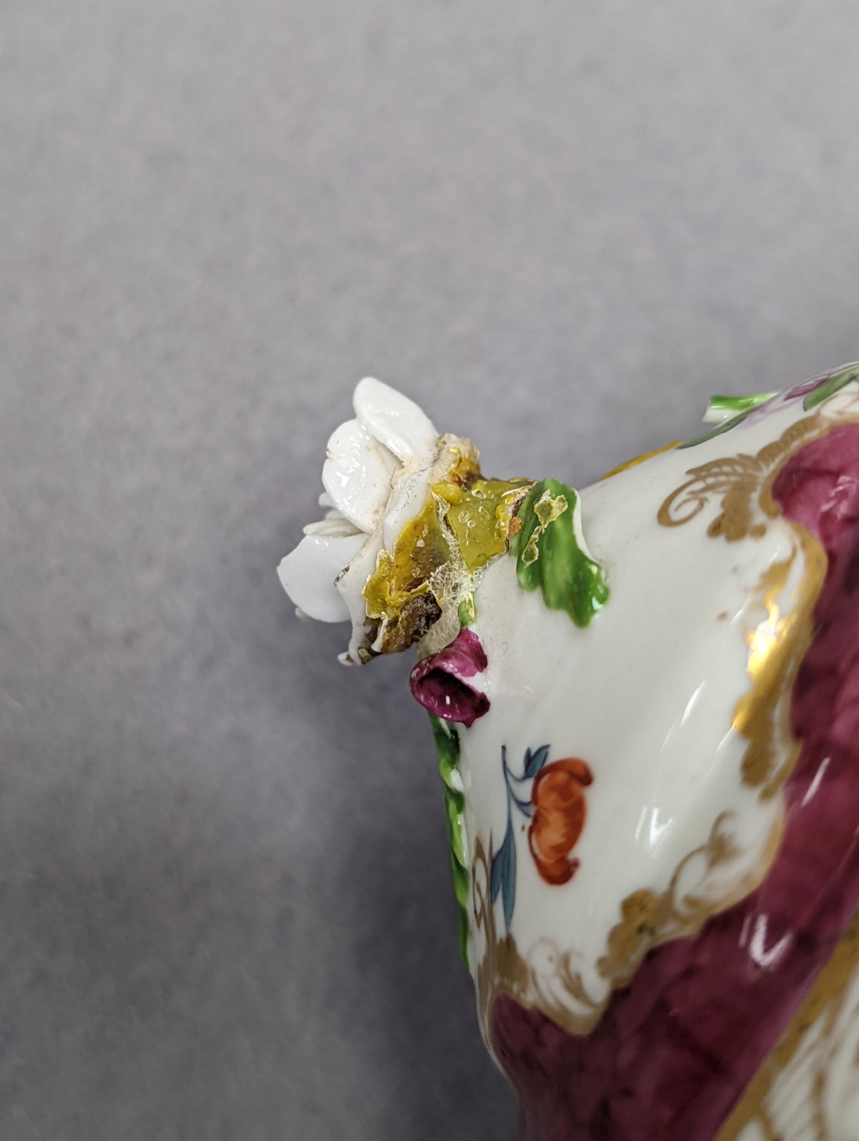 An 18th century Mennecy porcelain cup and cover, a Meissen style cup and cover, an English porcelain floral encrusted double inkwell and cover and a similar jar and cover